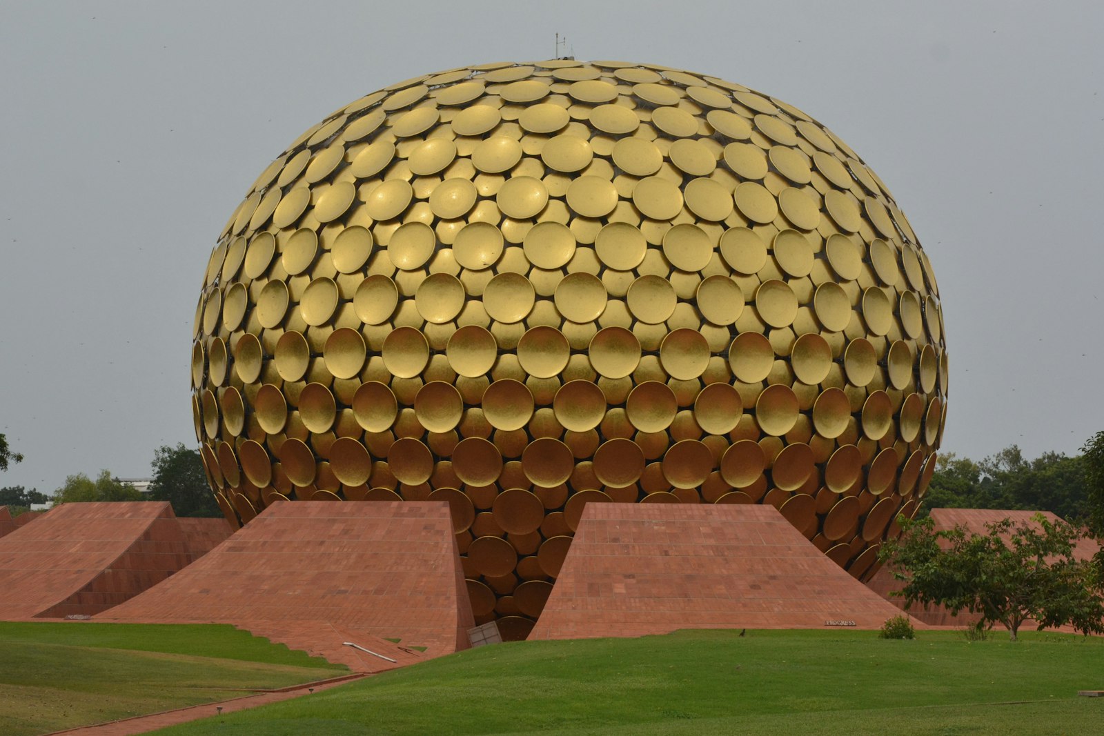 Close view of the golden Matrimandir dome in Auroville