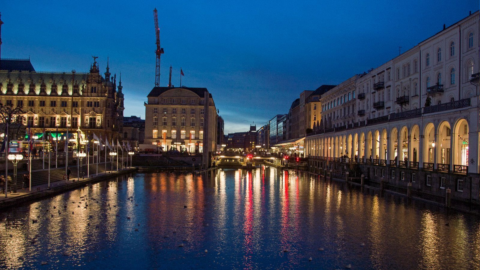 Alsterfleet canal and Hamburg Town Hall at dusk